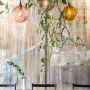 Avant garde Industrial Mews House | Hanging garden in dining area | Interior Designers